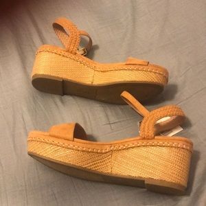 Beautiful New wedge sandals with tag.